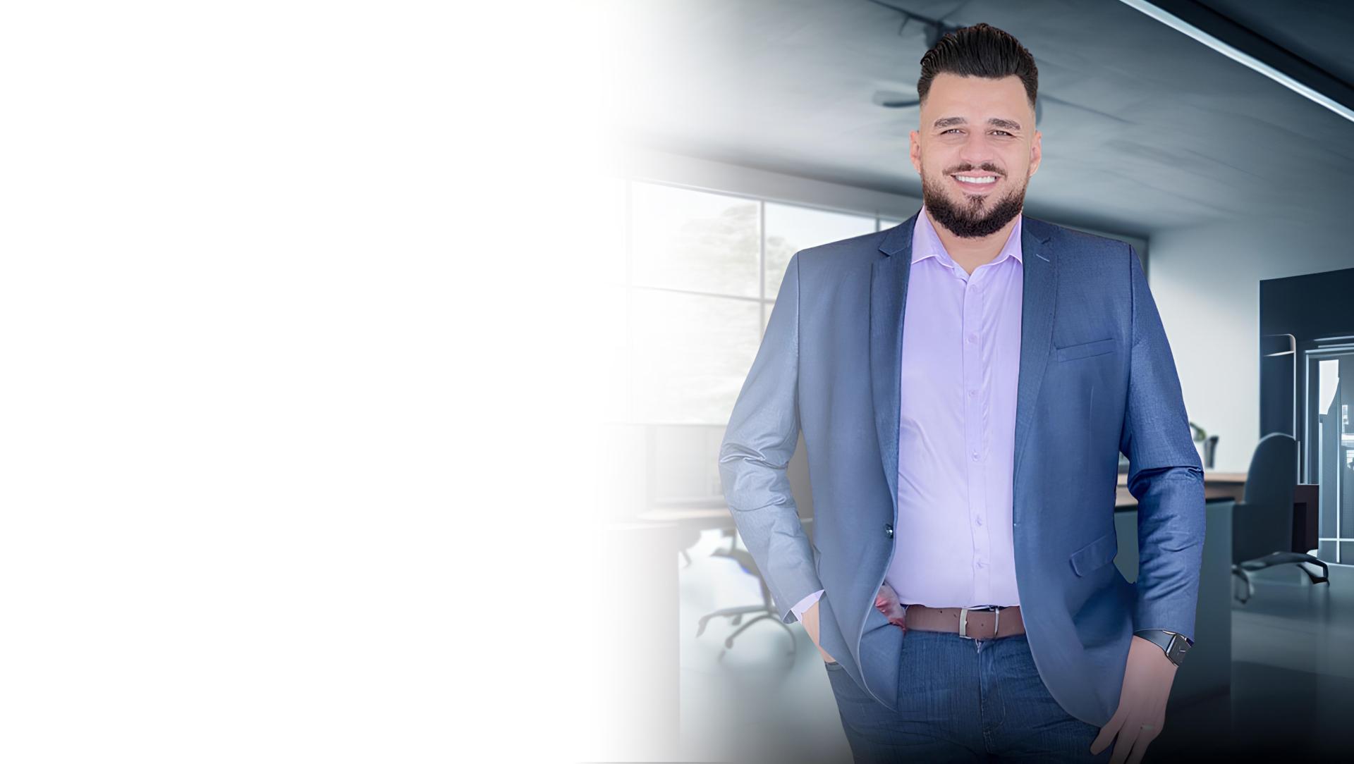 Fundador da empresa em traje executivo em ambiente corporativo